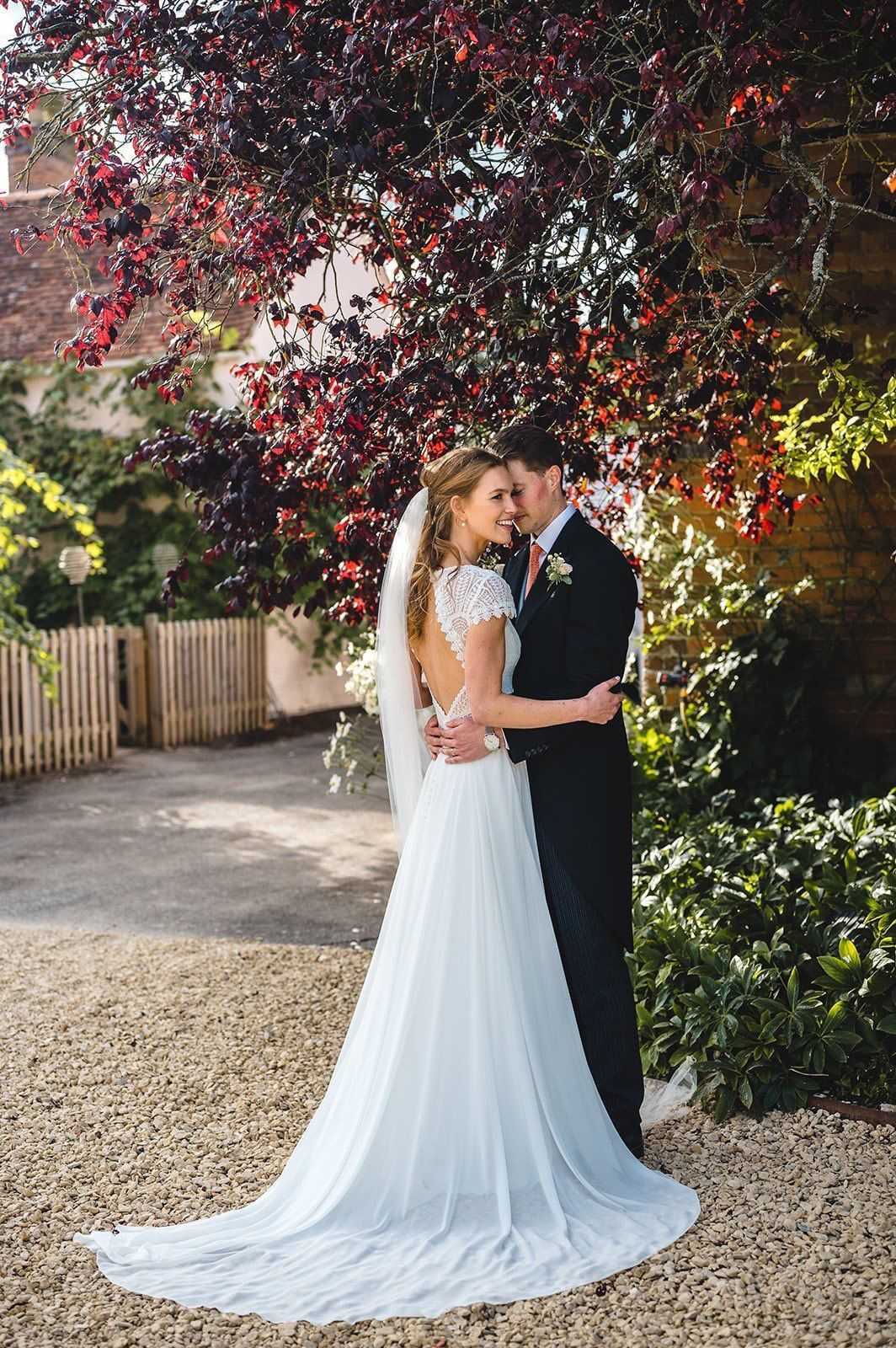 Couple on wedding day holding hands